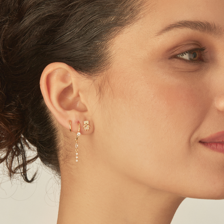 PIERCING OORBEL GOLD TREVI
